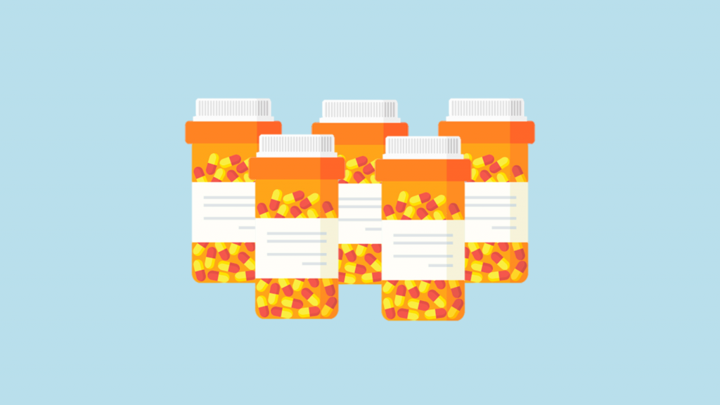 Two rows of prescription pill bottles